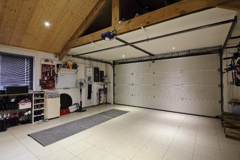Three Garage Door Noises: What Causes Them and What You Should Do